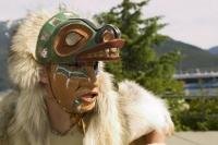 Chilkat tribe dancer in traditional costume depicting an animal of the area in Haines, Alaska.