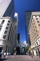 The corporate buildings of downtown Calgary tower above historical Stephen Avenue Walk. Stephen Avenue Walk was declared a historic site in 2002 and is a