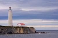 The Cap-des-Rosiers Lighthouse sits at Land's End on the Gaspesie Peninsula along Highway 132 in Quebec, Canada. This tall lighthouse looks out over the sea and is still open for visitors from late June to late September.