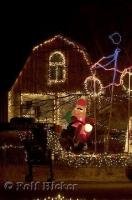 A country barn style house is decorated wtih christmas lights in Utah, USA.