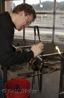 Demonstrating the art of glassblowing at the Jennifer L Sears Glass Art Studio in Oregon, USA.