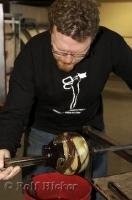 An artist of glass blowing at the Lincoln City Glass Center in Oregon, USA.