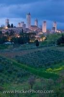 The unmistakable skyline of the historic town of San Gimignano in Siena, Tuscany, Italy at dusk. Known for its dominating towers San Gimignano is sometimes nicknamed the Medieval Manhatten.