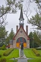 The Memorial Church, built in the 1920's, is one of the recognizable features of the Grand Pre National Historic Site in the town of Grand Pre in the Bay of Fundy in Nova Scotia. This church was built on the ruins of the old Acadian Church.
