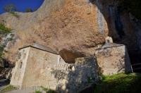 The famous Monastery de San Juan de la Pena in Sierra de la Pena in Aragon, Spain is pictured against the massive rock.