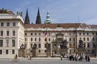 Tourists line up outside the entrance to the Prague Castle in the Czech Republic waiting to pay so they can explore this fascinating place.