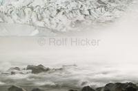 Photo of a waterfall and Mendenhall Glacier in the background