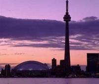 Enjoy a Toronto Vacation while on Ontario Holidays and experience a sunset with Torontos Skyline in the foreground