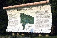 An interpretitive sign and map at the entrance to Algonquin Provincial Park in Ontario, Canada.