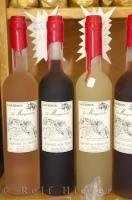 Bottles of aperitifs on display at a shop in Gourdon village in Provence, France in Europe.