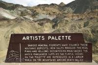 A sign explaining how the Artists Palette was formed in Death Valley National Park, California, USA.
