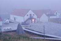 A typical foggy day at Battle Harbour fishing village in Southern Labrador, Canada