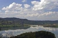 The steep mountain range surrounds the Kochelsee Lake in the Bavarian Alps in Bavaria, Germany in Europe.