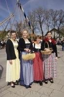 A line up of proud ladies wearing their Dirndl's which are traditional Bavarian costumes worn by women.
