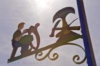 A local Bavarian sign ready to be attached to the Maibaum in the village of Putzbrunn, Germany.