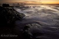 A magical sunset heralds one of the final scenes in a spectacular light show at Ruby Beach on the Olympic Peninsula of Washington, USA.