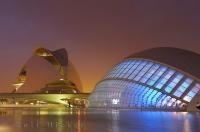The lights in the city of Valencia create a beautiful hue over La Ciutat de les Arts i les Ciencies Complex.