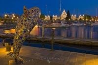 A mosaic tiled orca whale along the harbour front in the beautiful city of Victoria, capital city of BC.