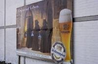 A large billboard advertising Weihenstephan beer with a slogan saying Thirsty for Life in Freising, Bavaria in Germany makes for a great picture.