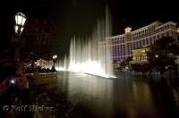 Streams of water shoot up into the sky during the show in front of the Bellagio Hotel and Casino in Las Vegas, Nevada.