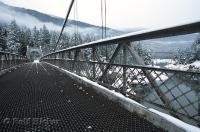The historic Alexandra Suspension Bridge crosses the Fraser River in BC, Canada.