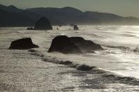 The rugged Oregon coastline backdrops Cannon Beach and Haystack Rock.