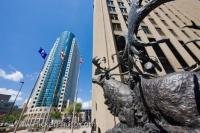 The front of the bronze sculpture of caribous crossing a river, which is actually called 'Seal River Crossing' stands proudly outside the Richardson Building, near the Canwest Place Building in downtown Winnipeg in Manitoba, Canada.