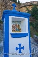 The ceramic tile picture representing the crucifixion at the entrance to the Castle of Guadalest in the town of Guadalest in Comunidad Valenciana, Spain.