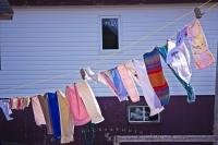 People in Conche, Newfoundland in Canada find the best way to dry their clothes is to hang them in the fresh air on a clothesline.
