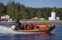 The Pacific Region Canadian Coast Guard squad at the Pulteney Point Lighthouse in British Columbia, Canada.