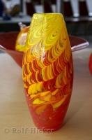 The artists at the Lincoln City Glass Center in Oregon, turn out beautifully colored vases.