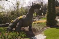 The dinosaur plant sculpture is one of the features of the Cullen Gardens and Miniature Village in Whitby, Canada.