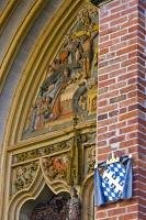 This decorative mural is found on the facade above the entrance to Martinskirche or St Martin's Church as it is known in English.