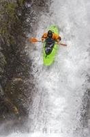 Preparing for a nose dive during extreme kayaking in the Catalan Pyrenees, Spain.