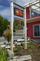 A restaurant sign indicates that time almost does seem to stand still in Alert Bay on Northern Vancouver Island in British Columbia, Canada.