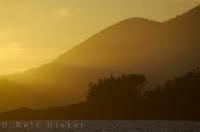 The sunset in Nootka Sound on the West Coast of Northern Vancouver Island brings out many unexpected colors along the coastline.