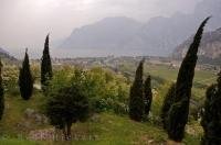 Garda Lake lies in a mist by the shores of Torbole in the Trentino Alto region of the South Tyrol, Italy in Europe.