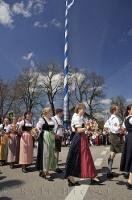 A young dance group performs a routine at the German Maibaumfest in Putzbrunn.