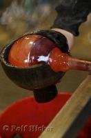 A scultping cup is a technique used in the art of glassblowing.