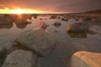 The sun sets along the shores near Rocky Harbour on the Great Northern Peninsula of Newfoundland.