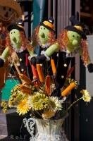 Homemade Halloween decorations beautify a floral arrangement at a florist stall in Place d'Armes in Old Montreal in Quebec, Canada.