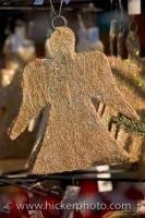 This hanging angel christmas tree ornament was for sale at the christmas markets in the town of Erbach in the state of Hessen in the Odenwald area of Germany. Hanging christmas tree ornaments of all kinds can be found in the christmas markets.