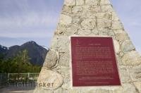A plaque stands on the shores of the Fraser River and explains the history of Fort Hope in British Columbia, Canada.