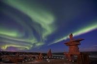 A stunning light show of the Aurora borealis over the town of Churchill on the shores of the Hudson Bay in Manitoba, Canada.