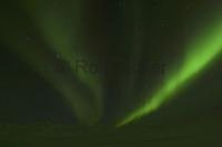 The sky comes alive in the Alaskan Arctic at night with the Aurora Borealis.
