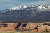 A dramatic contrast between the La Sal Mountains and the deep canyons of Canyonlands National Park.