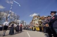The audience watches the activities around the Maibaum in Putzbrunn, Southern Bavaria, Germany.