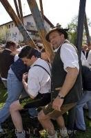 This pole is used to aid in the lifting of the Maibaum at this festival in Putzbrunn, Germany.