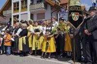 The audience enjoys the celebrations of the Maibaumfest in Putzbrunn, Southern Bavaria.