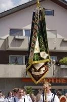 The decorative flags are historic symbols at the Maibaumfest in Putzbrunn, Germany.